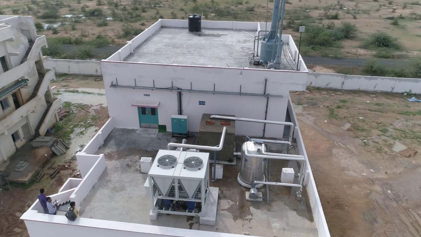 Event space with projector screen and floor balloons