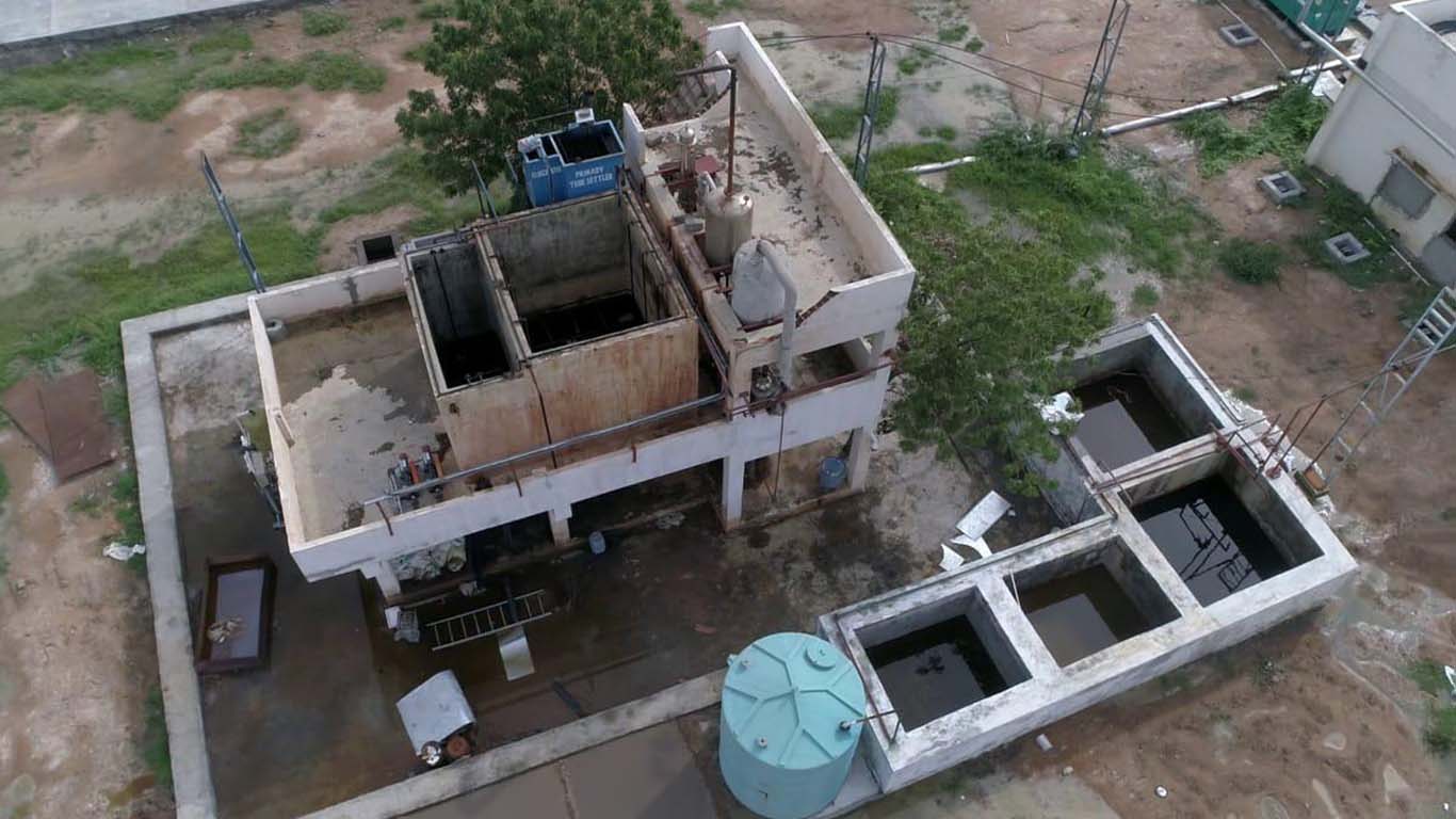 Event space with projector screen and floor balloons