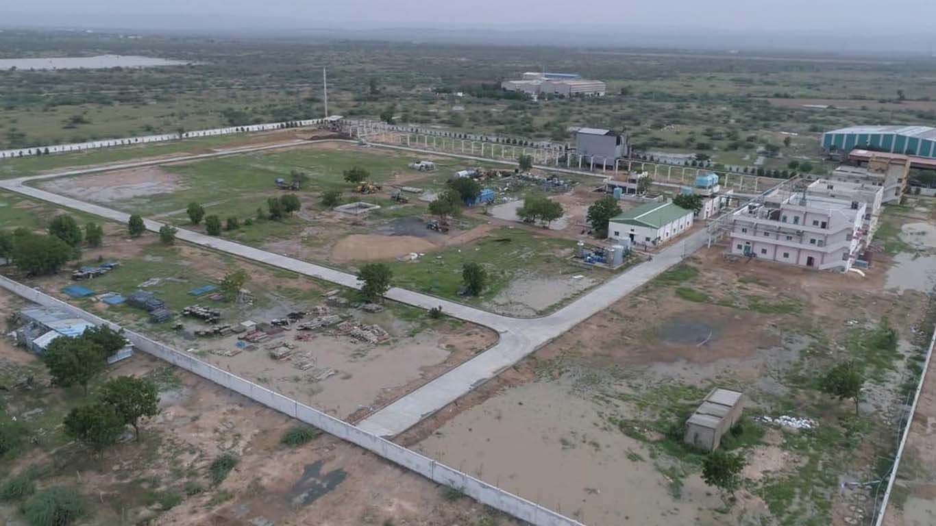 Birthday setup with pink and white balloon arch