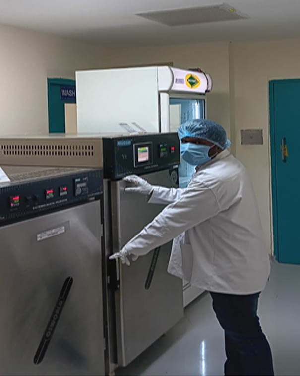 Event space with projector screen and floor balloons